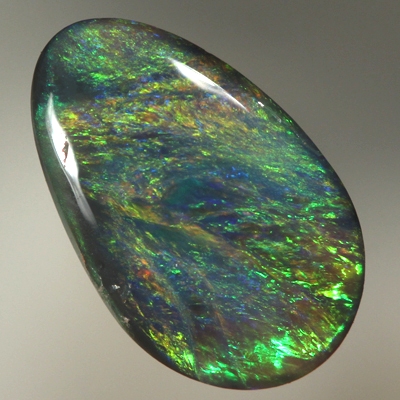 SOLID BLACK OPAL Strong, bright golden fire. Orange and green